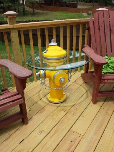 Hydrant table Fire Hydrant Table, Fire Hydrant Craft, Fire Hose Projects, Firefighter Decor, Fire Hose, Fire Extinguisher, Fire Station, Fire Dept, Fire Department