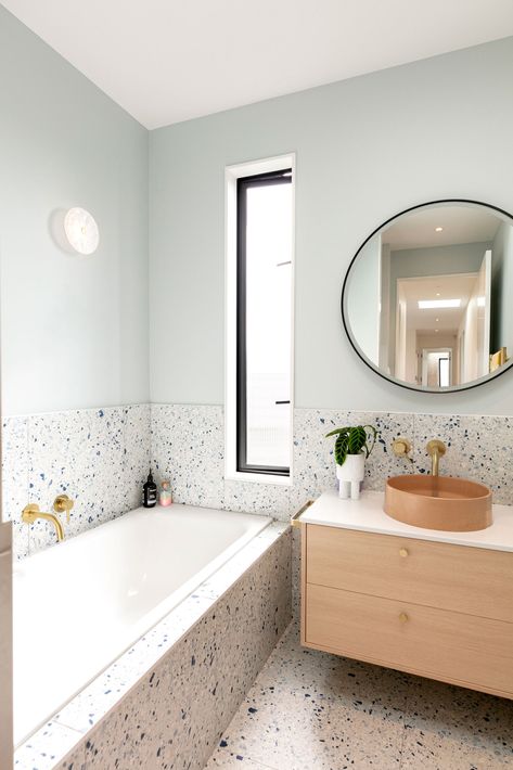 This coastal new build is a colourful dream home Terazzo Bathroom Interior Design, Terrazzo Tiles Bathroom, Terrazzo Bathroom Design, Bathroom Terrazzo, Tile Around Bathtub, Terrazzo Bathroom, Blue Terrazzo, Built In Bathtub, Built In Bath