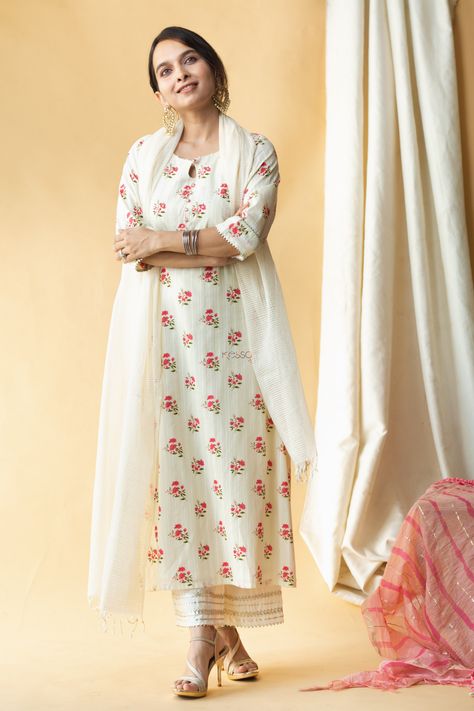 Tailored out of 100% cotton, the classic A-line kurta in ivory is adorned beautifully with classic floral print. The Dobby cotton imparts a unique texture while offering breathable comfort throughout the day. Marhaan is further embellished with shimmering gota and bijiya work. The kurta features a classic round neckline, 3/4th sleeves, and graceful Kota Doria dupatta. Pair the muted charm of Marhaan with cotton gotta palazzos from our collection of bottoms. Plazo Suit Design, Gota Work, Kurta Dress, A Line Kurta, Work Online, Suit Design, Dupatta Set, Stylish Dress Designs, Designer Dresses Indian