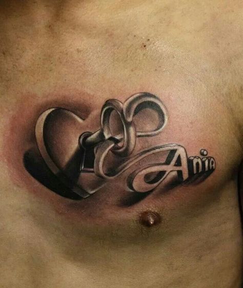 This is a great idea for my chest but with color and my sons name! Wife Name Tattoo For Men On Chest, Wifes Name Tattoo Ideas For Men, Name On Chest Tattoo, Girlfriend Tattoos For Men, Husbands Name Tattoo Ideas For Wife, Girlfriend Name Tattoos For Men, Wife Name Tattoo, Chest Tattoo Name, Team Tattoo