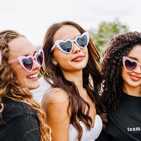 WE’VE GOT HEART EYES… …for these Pearl Heart Shaped Sunglasses 🕶️ Add. To. Cart #bridalaccessories #bridalstyle Photography: @constancedoylephotography Gloves: @kerryparkerofficial Bridal outfits: @twintylondon Stylist/Creative director: @jade.m.wallace MUA: @oliviadownsmakeup @hannahjoymua Socks: @socksandsass Venue: @bottleandglassinn Models: @laylaabbey @claraleaf @indiahillback @francesca_stobo Model agency: @edenmodelmanagement Bride Sunglasses, Beach Bachelorette Party, Wedding Sunglasses, Pearl Bride, Hen Party Accessories, Heart Shaped Glasses, Veiled Hats, Bachelorette Party Beach, Heart Shaped Frame