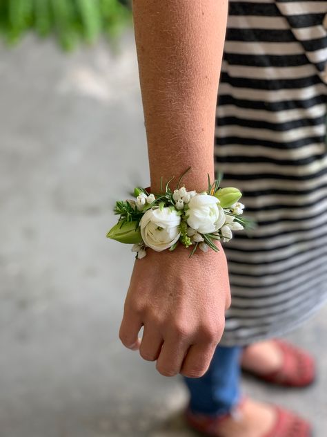 Wrist corsage created with ocally sourceed Spring blooms by Local Color Flowers. www.locoflo.com Wedding Corsage Wrist, 2024 Corsage Trends, Dainty Wrist Corsage, Small Wrist Corsage Prom, Dainty Corsage Prom, Small Corsage Prom, Petite Wrist Corsage, Simple Wrist Corsage Wedding, Simple Wrist Corsage Prom