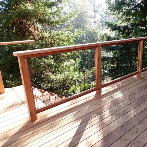 Do you have a strategy to remodel your home exterior in the future? If yes, it seems that the fencing can be one from the list to be enhanced or adjustment. Hog Panel Fence, Wild Hog Railing, Wire Deck Railing, Panel Fence, Cabin Deck, Deck Skirting, Deck Railing Ideas, Patio Railing, Deck Railing Design