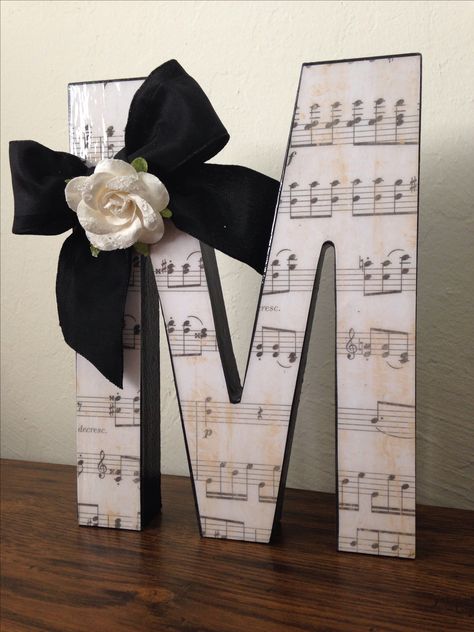 Cute DIY gift for music teacher...use their initial, school name initial, etc. Sheet Music Party Decorations, Diy Music Notes Decor, Piano Themed Party Decoration, Choir Teacher Gifts Diy, Sheet Music Decorations, Senior Band Gift Ideas, Music Gifts Diy Cute Ideas, Gift Ideas For Music Teachers, Music Grad Party Ideas