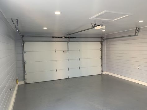 Shiplap garage.   Stained floor Shiplap Wall Garage, Shiplap In Garage, Garage Shiplap Wall, Shiplap Garage Interior, Shiplap Garage, Garage Door Interior, Garage Room Ideas Bedrooms, Interior Garage Door, Garage Door Trim