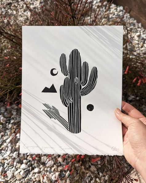 Olivia Yuen on Instagram: "Carnegiea gigantea (Saguaro cactus)🌵 The image of the Saguaro cactus is so common in Sonoran desert art, that I hesitated up until this point to create a print of one. I decided to make a simple design that celebrates it's recognizable form and unique structure." Cactus Screen Print, Cactus Lino Print, Desert Linocut, Cactus Linocut, Linocut Prints Simple, Print Carving, Cactus Leaves, Lino Cut, Linocut Art