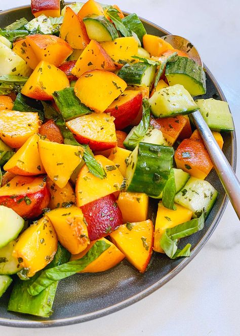 Easy Cucumber, Peach, and Basil Salad! Cool, crunchy cucumbers combined with sweet, juicy peaches and dressed in a peppery basil vinaigrette is a great way to make the most of summer and all its gorgeous flavors. This refreshing salad is easy to make and goes great with grilled meat. #simplyrecipes #peach #salad #cucumberpeachsalad #summersalad Burpless Cucumber, Peach Salad Recipes, Basil Salad, Summertime Salads, Cucumber Salad Recipe, Basil Vinaigrette, Foods For Healthy Skin, Summertime Recipes, Peach Salad