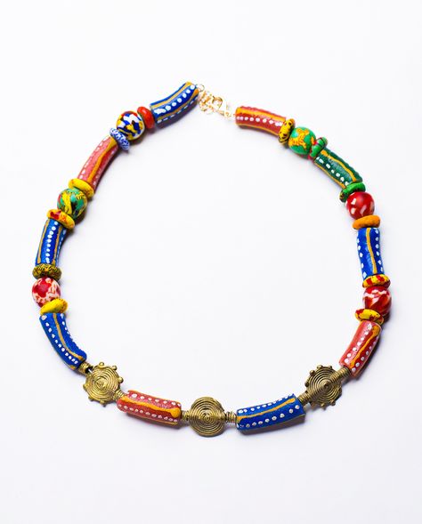 AFRICAN BEAD CHOKER Krobo Glass Bead Necklace with Sun Baule from Ghana Original price was: ₦40,000.00 Website Current price is: ₦36,000.00. HOW TO ORDER(shop on website with discount) 1. Watch the pinned 📌 video on our page on how to shop on the website 2. Click the link in our bio to shop 3. Send us the post to our DM (no discount) . . . Our distinguished photographer @adekunleolaniran_ . . Our distinguished model @boi_4rm_eruwa Bead Choker, African Beads, Glass Bead Necklace, Beaded Choker, Glass Bead, Bead Necklace, Ghana, Choker, Glass Beads