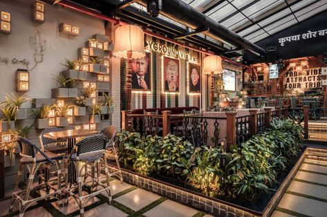 This concrete restaurant merges brutalist architecture with a vertical garden design for an inviting green vibe! | Yanko Design South Indian Restaurant Interior Design, Concrete Restaurant, Playground Restaurant, Grill House, Terracotta Flooring, Green Vibe, Modernist Interior, Cinder Block Walls, Pub Interior