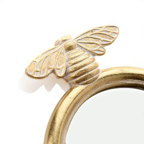 A fun and stylish mirror, this is sure to add something special to any living space. With a gold finish and a bee detail, this is the perfect gift or homeware option for stylish trend-setters. Details: Wall hook mirror Bee detail Gold finish Bee Mirror, Stylish Mirror, Bee Wall, Hook Design, Worcester, Gorgeous Gift, Accessories Storage, Wall Hooks, Something Special