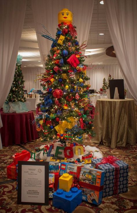 My son would LOVE this Lego Themed Christmas Tree -- and especially all the stuff under it! Lego Christmas Tree, Birthday Tree, Themed Christmas Tree, Christmas Trees For Kids, Lego Christmas, Tree Themes, Creative Christmas Trees, Unique Christmas Trees, Cool Christmas Trees