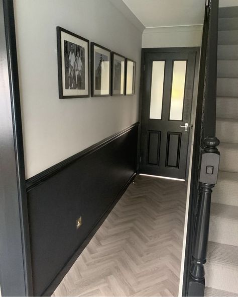 White Walls Black Woodwork, Dark Skirting Boards Hallway, Half Black Hallway, Hallway Paint Colors With Wainscoting, Panelled Hallway Colour Ideas, Dark Grey Panelling Hallway, Tall Wainscoting Entryway, Black Staircase Panelling, Black And White Wall Panelling