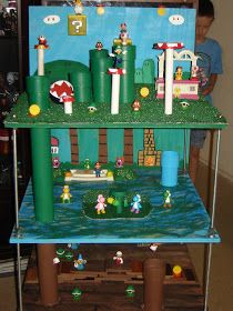 This is Edward's Mario house. Its 4 foot by 2 foot. It took us a couple months to design it and the last few weeks painting it a... Mario Playset Diy, Diy Super Mario Bedroom Decorations, Super Mario Doll House Diy, Mario Shelf, Mario Dollhouse, Mario House, Mario Bros Doll House, Mario Diy, Princess Doll House