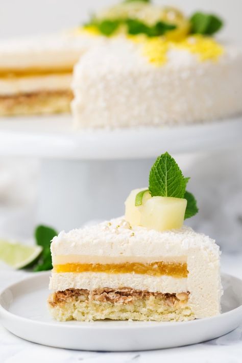 Tropical mousse cake decorated, coconut ... | Premium Photo #Freepik #photo #food #light #cake #bakery Mango Coconut Mousse Cake, Tropical Cakes, Sultana Cake, Mango Mousse Cake, Coconut Mousse, Light Cake, Slice Cake, Asian Cake, Mango Mousse