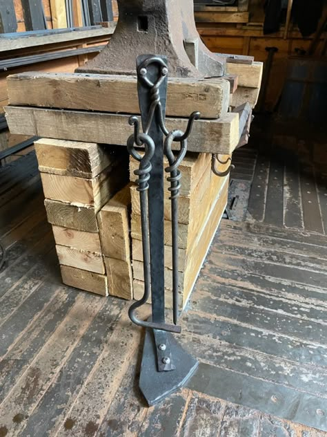 This fireside set comes complete with heavy duty stand. All hand made in my small forge in Cambridgeshire, England. It is available from my etsy store along with lots of other items. Cambridgeshire England, Fire Pokers, Blacksmith Projects, Classy Tattoos, Fireplace Tools, Family Tradition, Metal Projects, Metal Flowers, Blacksmithing