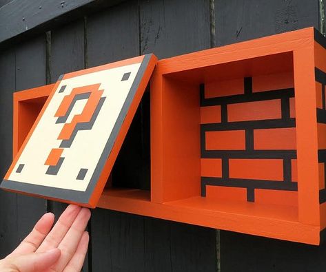 Super Mario Bros. Shelf Super Mario Diy, Mario Diy, Gamer Bedroom Ideas, Nintendo Room, Shadow Box Shelf, Super Mario Room, Geek Home Decor, Mario Room, Nerdy Decor