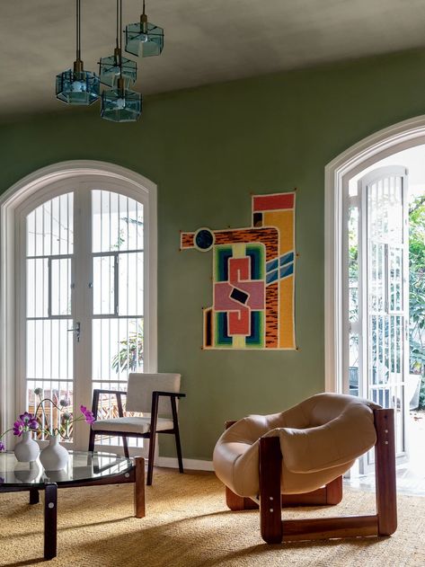 A Trio of Archways Is the Defining Feature of a Colorful Brazilian Home | Architectural Digest | Architectural Digest Brazilian Home, Old Japanese House, Percival Lafer, Green Couch, Work Skills, Indian Rugs, Formal Living, Vintage Textiles, Architectural Digest