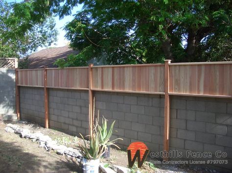 Tongue and gvoove redwood fence on top of wall Fence On Top Of Brick Wall, Wood Fence Over Block Wall, Brick Fence Extension Ideas, Back Yard Brick Wall, Garden Wall With Fence On Top, Brick Wall Topper Ideas, Non Wood Fence Ideas, Wall Extension Privacy, Privacy Fence Ideas On Top Of Block Wall