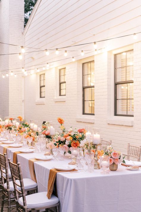 Quaint and romantic backyard wedding reception with orange florals, string lights and candles. Photo: @charlastorey Orange And Pink Wedding, Orange Wedding Colors, Orange Wedding Flowers, Aspen Wedding, Orange Table, String Lights Wedding, Table Lights, Candle Table, Sunset Wedding