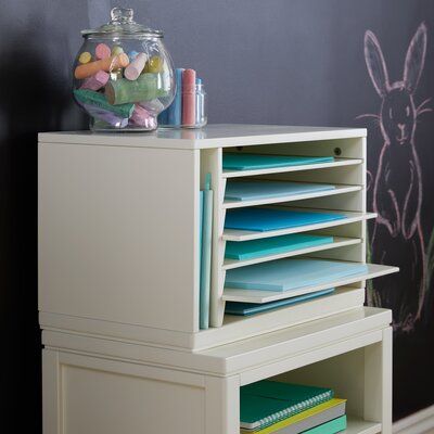 Comprised of unique storage solutions, functional workspaces, and special places to curate and display children's art, the Martha Stewart Crafting Kids' Collection by Guidecraft inspires a child's artistic expression. Innovative designs along with quality pieces, together establish a comprehensive, child-centered space to create using a variety of media. Constructed from a durable combination of easy-to-clean solid pine and engineered wood, the Kids' Paper Organizer - is the perfect tabletop uni Kids Art Storage, Construction Paper Storage, Cubby Organizer, Office Closet, Paper Organizer, Martha Stewart Crafts, Diy Couch, Open Ended Toys, Kids Crafting