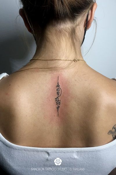 Thailand Tattoo Design, Sak Tattoo Yant, Thai Spine Tattoos For Women, Thai Back Tattoos For Women, Small Sak Yant Tattoo, Thai Spine Tattoo, Thailand Inspired Tattoos, Small Thai Tattoo, Thai Back Tattoo