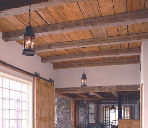 Reclaimed natural wood head board paneling continues on ceiling. Description from pinterest.com. I searched for this on bing.com/images Barn Wood Ceiling, Bungalow Remodel, Exposed Beams Ceiling, Reclaimed Wood Ceiling, Wood Plank Ceiling, Beam Ceiling, Plank Ceiling, Old Barn Wood, Basement Ceiling