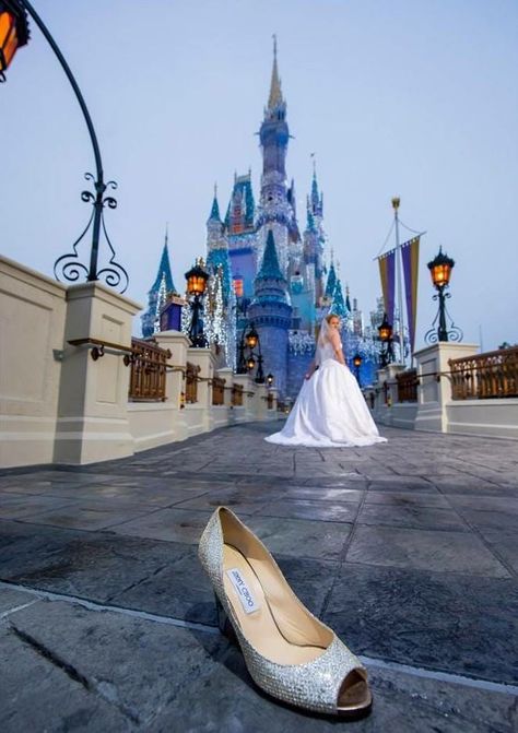 Bride with one missing shoe in front of Cinderella Castle Disney Wedding Venue, Disneyland Wedding, Disney World Wedding, Disney Wedding Theme, Disney Bride, Disney Weddings, Disney Fine Art, Disney Fairy Tale Weddings, Cinderella Wedding