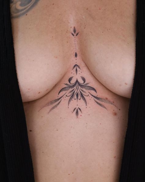 Dotwork and fineline ornamental sternum piece . . . . . #sternumtattoo #underboobtattoo #sternum #dotworkornament #dotworktattoos #subtletattoo #finelinetattoo #tattoosforwomen #aesthetictattoo #femininetattoo #bohotattoo #zwolletattoo #tattoozwolle Dragon Tattoo Sternum For Women, Sternum Flower Tattoo Women, Sternum Tatoos Woman, Tiny Sternum Tattoo Women, Sternum Tattoo Ornamental, Celestial Sternum Tattoo, Sternum Tattoo Women Flowers, Sternum Ornament, Sternum Tattoo Big Bust