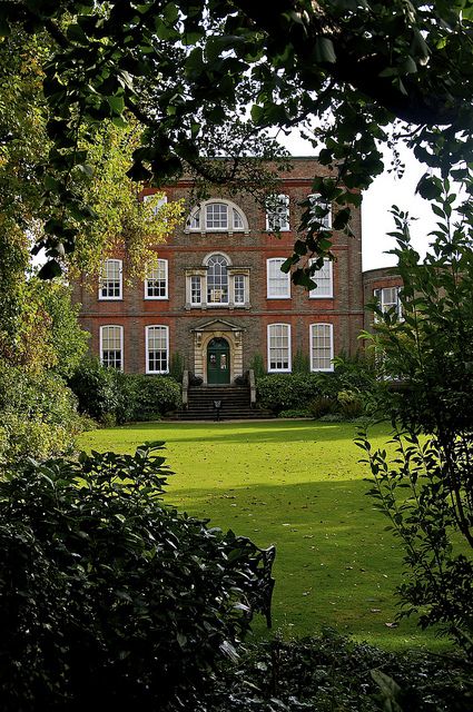 Peckover House, built in 1722, is a National Trust property located in North Brink, Wisbech, Cambridgeshire. The exterior of the house gives little idea of the elaborate and elegant interior of fine panelled rooms, Georgian fireplaces with carved over-mantels, and ornate plaster decoration. English Country Manor, English Manor Houses, Georgian Architecture, English Manor, Georgian Homes, English House, Grand Homes, Great House, English Country House