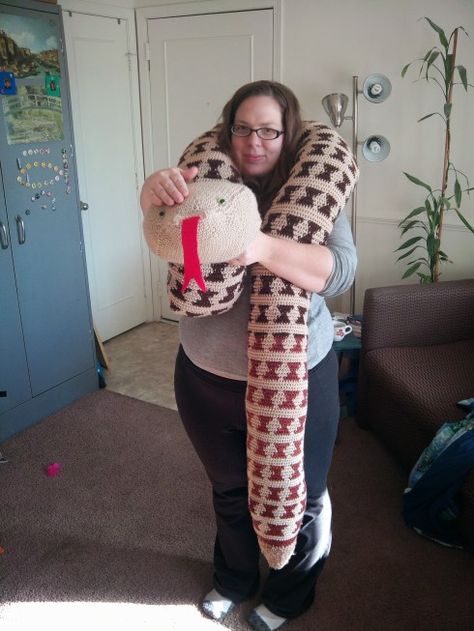 My new door draft snake along with the notes to make your own. Evil genius? Would have been if I'd actually thought to write a pattern as I went. Giant Crochet Snake, Crocheted Snake, Draft Snake, Giant Crochet, Crochet Snake, Drafty Windows, Evil Genius, Make A Door, Yarn Ideas