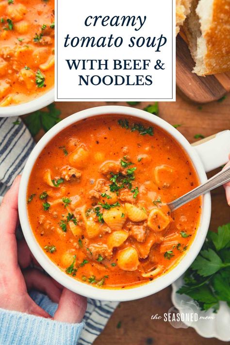 Creamy tomato soup with ground beef and noodles is an easy one-pot dinner that's ready in less than 45 minutes! Add a loaf of crusty bread or a simple green side salad for a delicious and family-friendly weeknight meal. Beef Orzo Soup, Soups With Ground Beef, Ground Beef Tomato Soup, Beef And Noodle Soup, Ground Beef Soup Recipes, Ground Beef And Noodles, Soup Sunday, Easy Taco Soup, Spicy Pasta