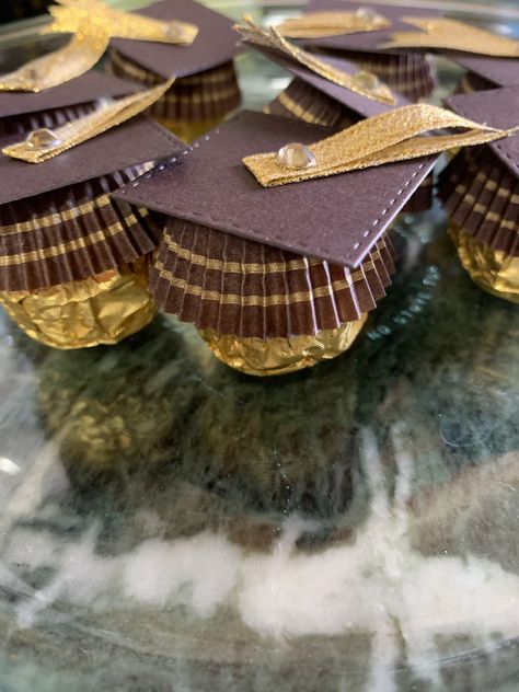 Ferrero Rocher chocolates with a cap topper Ferrero Rocher Graduation Cap Diy, Ferrorocher Chocolate Graduation, Ferro Rocher Graduation Caps, Ferrero Graduation Cap, Graduation Ferrero Rocher, Ferrero Rocher Graduation Cap, Graduation Hats Decorated, Graduation Brunch, Graduation Leis Diy