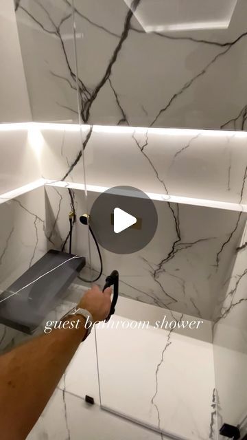 Luxury Homes and Renovations on Instagram: "shower check list: - curb less entrance ☑️ - heated floor ☑️ - floating bench ☑️ - tile in linear drain ☑️ - starphire frameless shower glass ☑️ - flush rain shower head ☑️ - large format porcelain slabs ☑️ - LED RGBW lights ☑️ - did we miss anything else? 😎😎 #interiordesign #shower #bathroomdesign #bathroomremodel #renogurus" Shower Stand Ideas, Floating Shower Bench, Rain Shower Bathroom, Shower Curb, Linear Drain, Shower Bench, Luxury Shower, Bathroom Remodel Designs, Frameless Shower