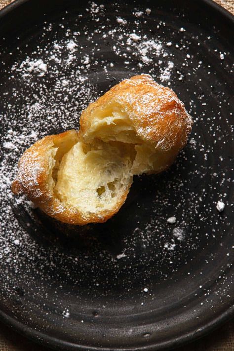 Zeppole are light and airy Italian donuts dusted with powdered sugar. #zeppole #donuts #zeppoledonuts #donutsrecipe #zeppolerecipe #zeppolephotography #italianrecipe #italiandessert Zeppole Recipe, Italian Donuts, Choux Pastry, Nut Recipes, Homemade Italian, Small Spoon, Italian Desserts, Cookie Scoop, Powdered Sugar