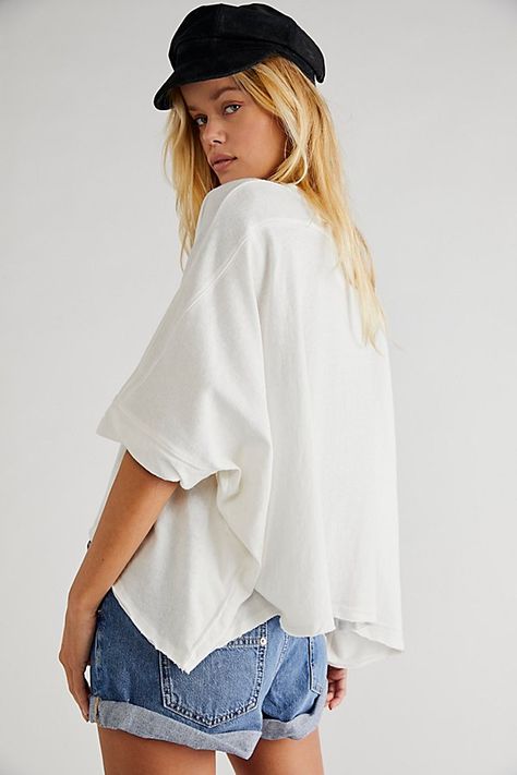 A perfect update to your everyday tee, this oversized style features a flowy silhouette with a slouchy fit.* Lightweight style* Draped sleeves* Cropped design We The Free Cc Tee, Flowy Shirts, Peach Nectar, Draped Sleeves, Basic White Tee, Thanksgiving Food, Free People Style, Drape Sleeves, Free People Clothing