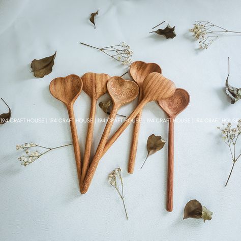 The wooden spoon heart made of Doussie wood is a real eye-catcher in your kitchen and features a sweetheart engraving. Use this heart-shaped spoon to stir, mix, and serve your favorite dishes. The perfect personalized gift for her, gift for him on any occasion, including a wedding, anniversary, engagement, housewarming, birthday, graduation, promotion, Valentine's Day, Mother's Day, Father's Day, Halloween, or Christmas, and great decor item on the table, party. Heart Spoon, Love Spoons, Wooden Kitchen Utensils, Vintage Tableware, Wooden Utensils, Wood Cover, Wood Spoon, Wedding Gifts For Guests, Gift Valentine