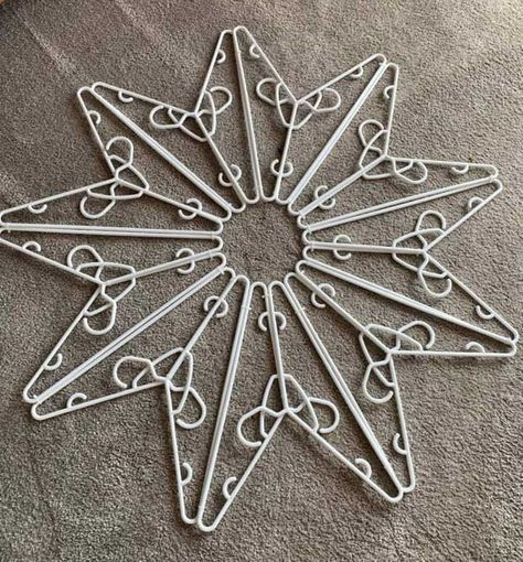 Hanger Star With Lights, Wire Hanger Star, Clothes Hanger Christmas Star, Plastic Hanger Star Diy, Coat Hanger Christmas Star, Coat Hanger Star Diy, Star Made Out Of Plastic Hangers, Stars Made From Plastic Hangers, Hanger Christmas Star