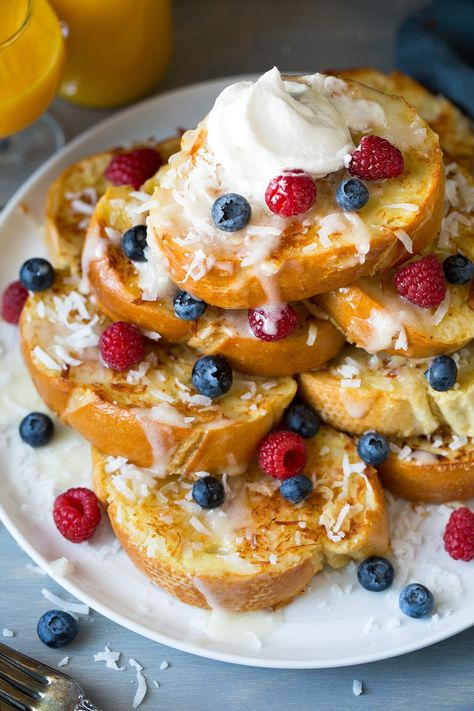 Coconut French Toast with an irresistible Syrup - this is a tropical dream! It's bursting with coconut flavor and it will leave you savoring every last bite! Try this syrup on pancakes, waffles and crepes too! #coconutsyrup #coconut #frenchtoast #breakfast #recipe Coconut Syrup Recipe, Coconut French Toast, Classic French Toast, Coconut Syrup, French Toast Sticks, Breakfast Goodies, French Toast Easy, French Toast Bake, Breakfast Idea