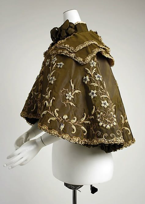 Opera cape (side view) Beer (French) Designer: Gustave Beer (French) Date: ca. 1896 Culture: French Medium: silk, wool Dimensions: Length at CB: 19 in. (48.3 cm) Credit Line: Gift of Everett S. Lee, 1980 Accession Number: 1980.588.1 1890s Fashion, Cape Designs, Costume Institute, Edwardian Fashion, Historical Dresses, Fantasy Clothing, Fantasy Fashion, Historical Clothing, Character Outfits