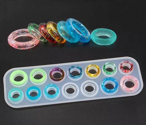 Ring silicone mould/14 rings mold. This shiny UV/Epoxy resin silicon mold is perfect for jewellery making and can make 7 faceted and 7 smooth rings in 7 different sizes. Approx size of mould@: 25.5cm x 8cm x 0.8cm The inner of the rings measure from 1.7cm - 2.3cm in diameter. Please note due to differences in monitor/light settings, colours of products can vary on your computer screen. I post all items within 24hrs of purchase (Monday to Friday). Resin Ring Mold, Rings Silicone, Kerajinan Diy, Silicone Molds Jewelry, Resin Jewelry Molds, Making Ring, Diy Ring, Formy Silikonowe, Crafting Tools