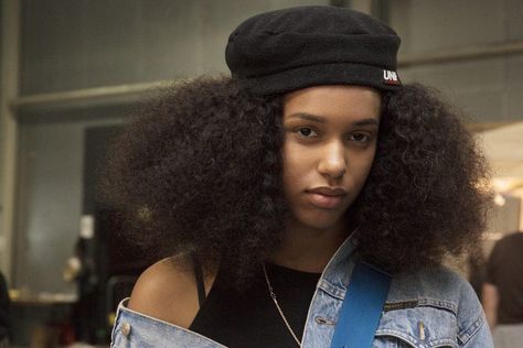 shot of model at afropunk with long afro curls wearing a beret Afro Hair With Hat, Afro With Hat, 90s Cookout, Beret Hairstyles, Emotional Availability, Beret Hair, Hair With Hat, Long Afro, French Girl Hair