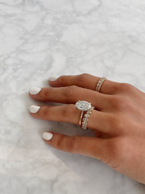 Layered Wedding Ring Set, Engagement Ring Oval With Wedding Band, Oval Stacking Engagement Rings, Stackable Oval Engagement Rings, Engagement Rings Stacking, Dainty Wedding Ring Stack, Stacked Bands With Engagement Ring, Most Elegant Engagement Rings, Oval Solitaire Wedding Stack