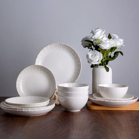 PRICES MAY VARY. Unique Design: Impress your guests and add a touch of style to your table with our 12-piece dinner set featuring a unique and charming relief design.The glaze is a soft off white - ivory shade. The contemporary spin on the outer pattern makes them look like they came from a small boutique. Simple in style, but stunning.Perfect for housewarming, Thanksgiving, Christmas, and other fun celebrations. It looks ultra classy and beautiful. Once you have it,believe can't wait to use thi Outer Pattern, Stoneware Plates, Relief Design, Plates And Bowls Set, Ceramic Dinnerware Set, Kitchen Ware, Stoneware Dinnerware, Ceramic Dinnerware, Small Boutique