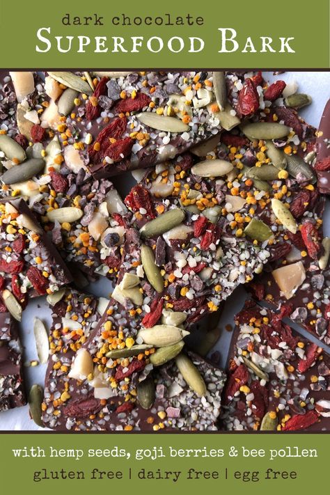 This Dark Chocolate Superfood  Bark is made with 7 superfoods, including hemp seeds, goji berries, and bee pollen. The combination of these powerhouse ingredients creates a dessert that is not just high in nutrition, but satisfying in texture and taste. This healthy dessert recipe is simple to make, Paleo, Vegan and can easily be made nut free. #paleo #vegan #chocolate Seed And Nut Chocolate Bark, Healthy Chocolate Bark Recipes, Nut Bark Recipes, Diary Free Dessert, Nut Free Paleo, Homemade Chocolate Bark, Healthy Board, Dark Chocolate Bark, Vegan Paleo Recipes