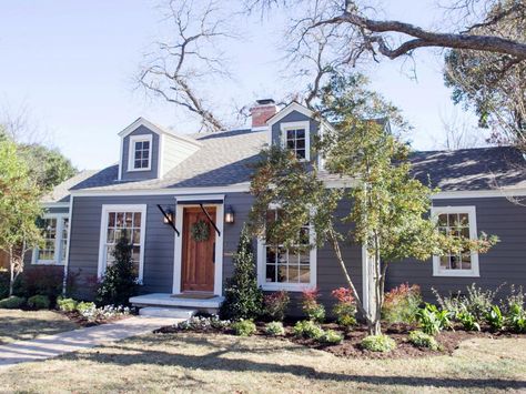 Chip and Joanna Gaines help a single foster-mom — and first-time homebuyer — update a quaint 1940 cottage, giving it a fresh and exuberant look that reflects the homeowner's personal style. From the experts at HGTV.com. French Country Exterior, Magnolia House, Chip Gaines, Trees For Front Yard, Brick Cottage, Hgtv Fixer Upper, 70s House, Romantic Retreat, Magnolia Market