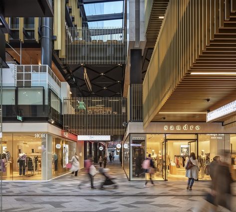 Turning the traditional idea of the ‘shopping mall’ inside out, Commercial Bay presents a new model for the retail typology: an open-air, laneway-based retail environment configured over three levels. The project embodies a spirit of generosity, creating two entirely new pedestrian routes through the city block, connecting transit nodes, and enhancing the pedestrian experience of the city center. Open Mall Design, Shopping Mall Exterior, Mall Concept, Mall Photography, Curtain House, Retail Facade, Entrance Lighting, Commercial Design Exterior, Retail Architecture