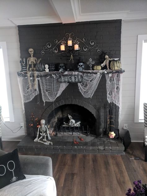 My fireplace mantle Halloween Chimney Decor, Spooky Fireplace, Fall Table Arrangements, Halloween Mantle Ideas, Modern Retro Living Room, Witchy Halloween Decor, Fall Office Decor, Office Decor Inspiration, Gothic Fireplace