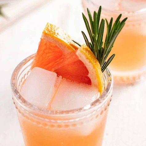 This Grapefruit and Gin cocktail is the perfect balance of sweet and tart. Ruby red grapefruit juice and elderflower liqueur flavor this classic sour Uncle Vals Gin Cocktails, Gin And Grapefruit, Grapefruit Cocktail Recipes, Tonic Cocktails, Elderflower Cocktail, Cocktails Vodka, Grapefruit Vodka, Grapefruit Cocktail, Rosemary Simple Syrup