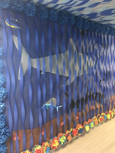 Diy Shark Decorations, Under The Sea Office Decor, Shark Week Decor, Breaker Rock Beach Vbs Door Decoration, Under The Sea Diy Decor, Beach Theme Hallway, Scuba Vbs Trunk Or Treat, Ocean Hallway Decorations, Underwater Decorations Ocean Themes