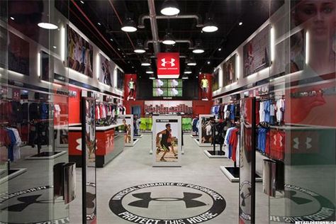 Under Armour (UA) Moves to Control Own Future by Opening 200 New Stores in 2016 - TheStreet Under Armour Store, Retail Space Design, Retail Lighting, Visual Merchandising Displays, Store Layout, Store Interiors, Sports Store, Retail Store Design, Boutique Interior